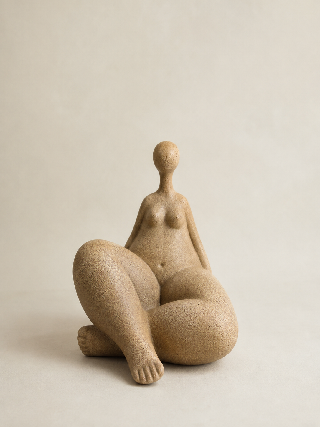 Escultura Mulher Sentada